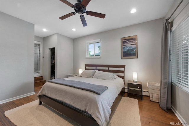 6283 S Prescott St, Littleton, CO 80120 - bedroom featuring baseboards, wood finished floors, a baseboard heating unit, and recessed lighting