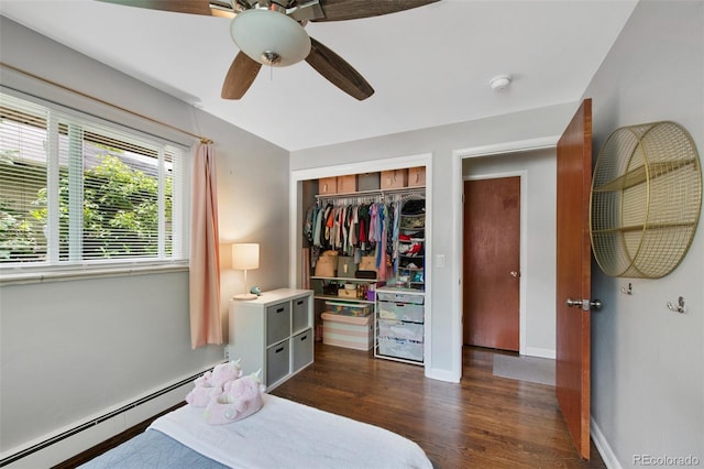 6283 S Prescott St, Littleton, CO 80120 - bedroom with a baseboard radiator, dark wood-type flooring, a closet, baseboards, and ceiling fan
