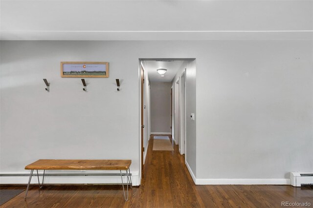 6283 S Prescott St, Littleton, CO 80120 - hallway featuring a baseboard radiator, wood finished floors, and baseboards