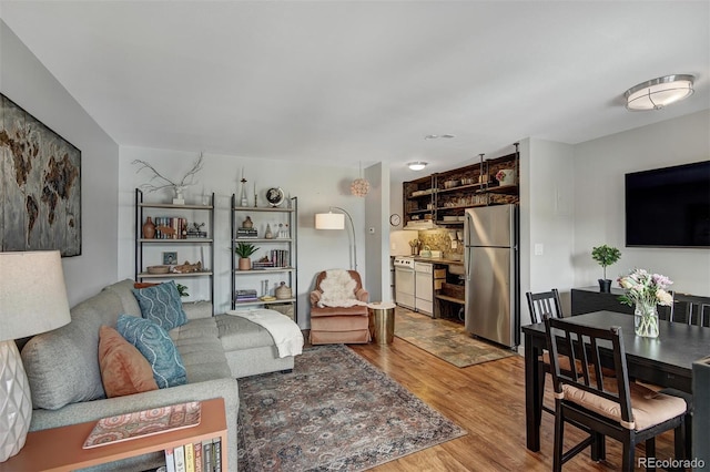 living area featuring light wood finished floors