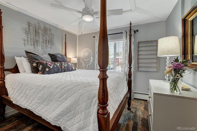 bedroom with ceiling fan, baseboard heating, and dark wood-style floors