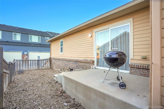 exterior space featuring a garage and a patio