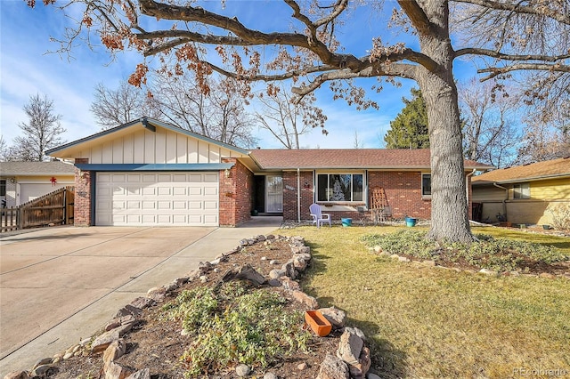 ranch-style house with a front yard and a garage