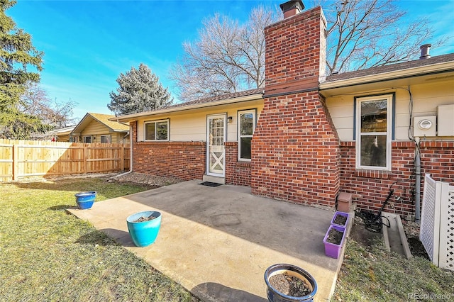 back of house with a patio area