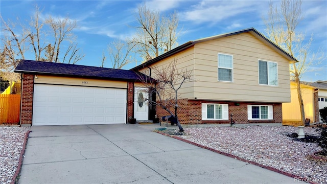 split level home with a garage