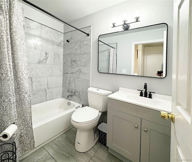 full bathroom with toilet, a textured ceiling, vanity, and shower / bath combo with shower curtain