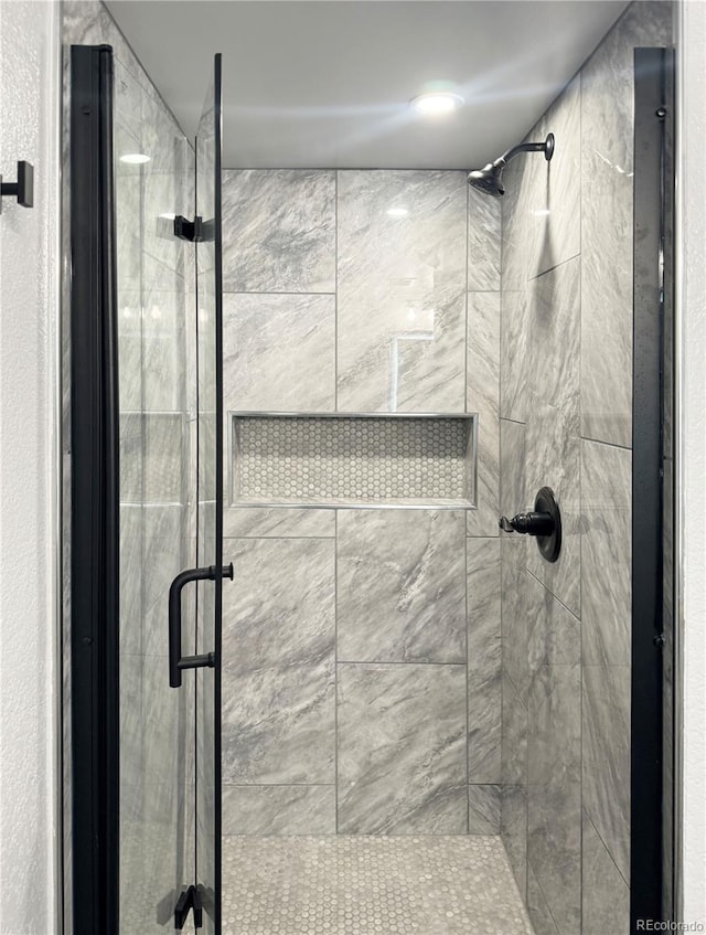 bathroom featuring walk in shower