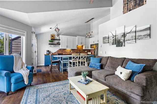 100 County Road 8344 Unit 3, Fraser, CO 80442 - living area with dark wood-style flooring and lofted ceiling