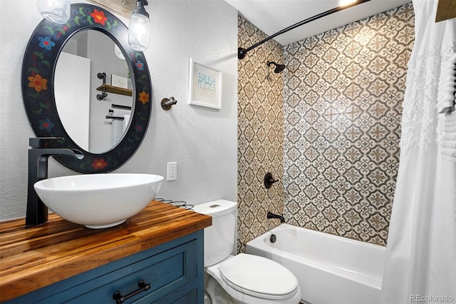 100 County Road 8344 Unit 3, Fraser, CO 80442 - full bathroom featuring shower / bath combo with shower curtain, vanity, and a textured wall