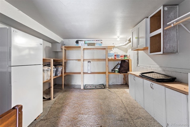 100 County Road 8344 Unit 3, Fraser, CO 80442 - basement featuring freestanding refrigerator