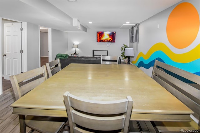 dining space featuring hardwood / wood-style floors