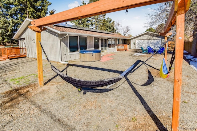 exterior space with a patio and a wooden deck