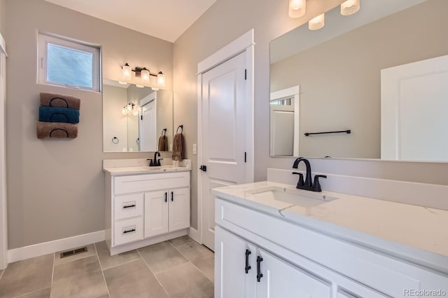 bathroom featuring vanity and tile patterned floors