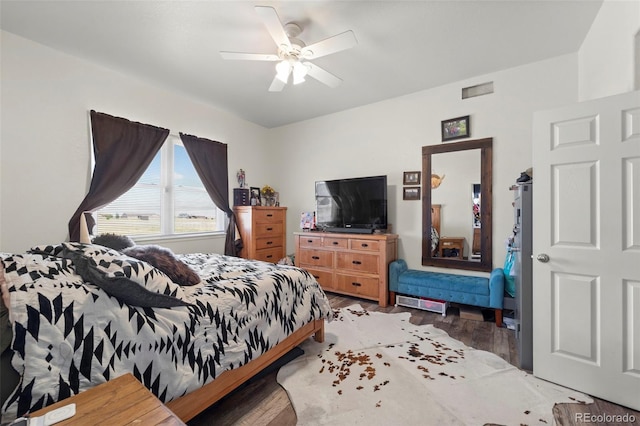38087 E 147th Pl, Keenesburg, CO 80643 - bedroom with light wood-style floors and a ceiling fan