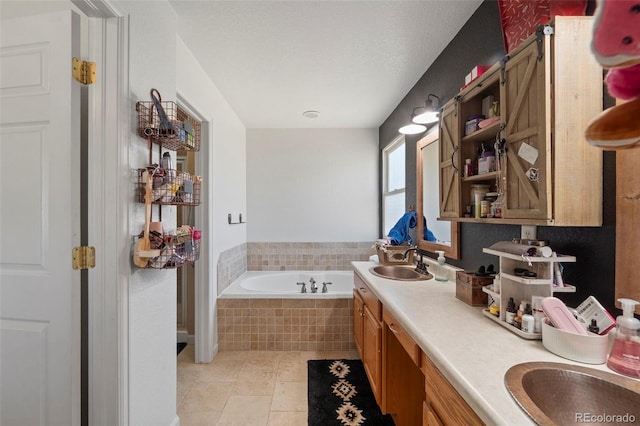 38087 E 147th Pl, Keenesburg, CO 80643 - full bath with a garden tub, double vanity, and tile patterned floors
