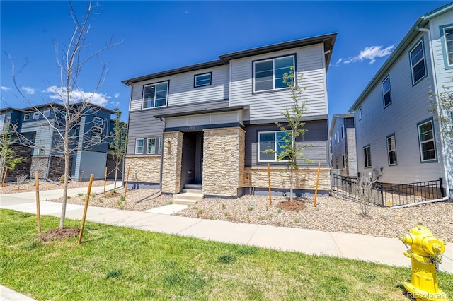 23951 E 40th Ave, Aurora, CO 80019 - view of front of property featuring stone siding
