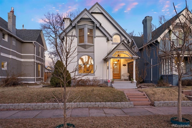 victorian home with a chimney