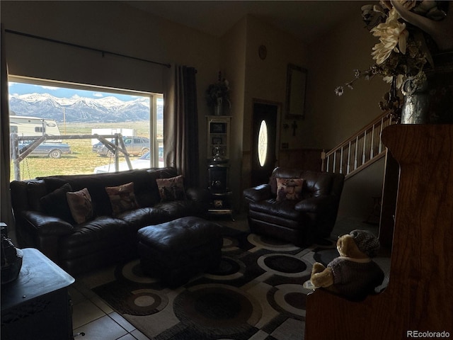 1970 County Road 241, Westcliffe, CO 81252 - tiled living area with stairway and a mountain view
