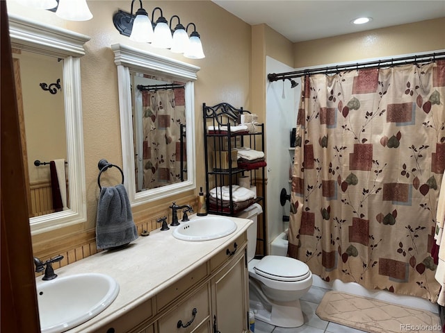1970 County Road 241, Westcliffe, CO 81252 - full bath featuring double vanity, toilet, tile patterned flooring, and shower / tub combo
