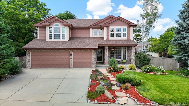 2521 Otter Ct, Lafayette, CO 80026 - craftsman house featuring driveway, a garage, a porch, and roof with shingles