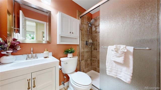 2521 Otter Ct, Lafayette, CO 80026 - bathroom featuring a tile shower and vanity
