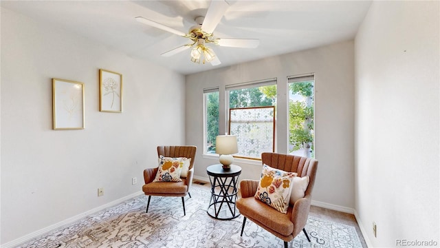 2521 Otter Ct, Lafayette, CO 80026 - living area with a ceiling fan and light colored carpet