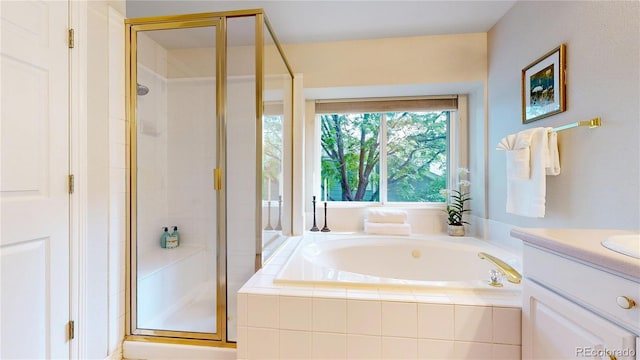 2521 Otter Ct, Lafayette, CO 80026 - full bathroom with a stall shower, a bath, and vanity