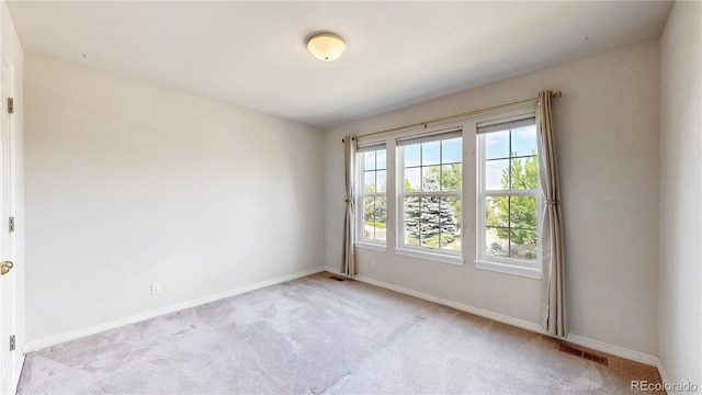 2521 Otter Ct, Lafayette, CO 80026 - empty room featuring light carpet and baseboards