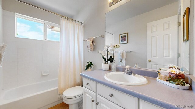 2521 Otter Ct, Lafayette, CO 80026 - full bathroom with vanity and shower / tub combo with curtain