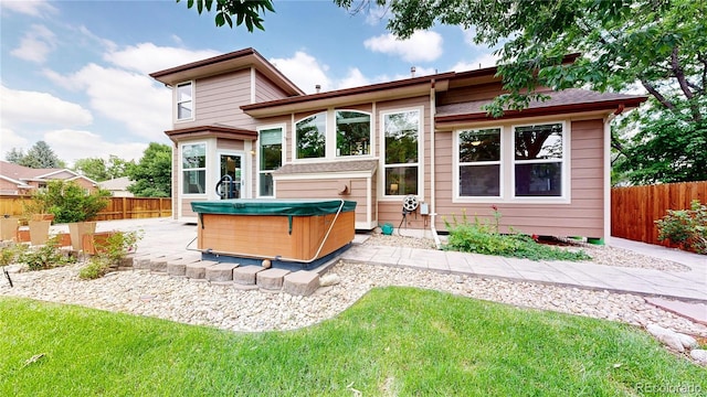 2521 Otter Ct, Lafayette, CO 80026 - back of house with a hot tub and a patio