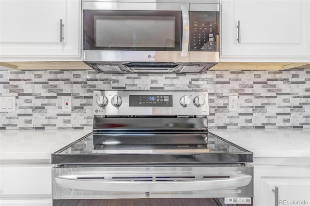 details with light countertops, appliances with stainless steel finishes, and backsplash