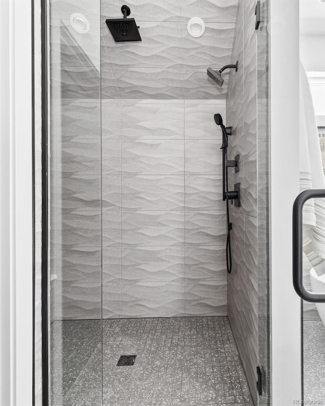 bathroom featuring walk in shower