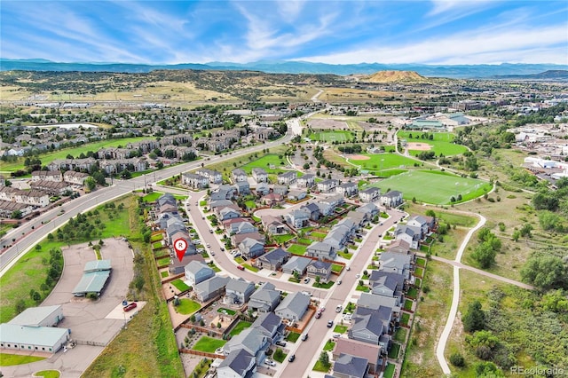 drone / aerial view featuring a mountain view