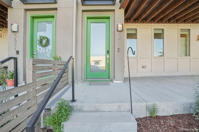 5668 Galena St, Denver, CO 80238 - view of exterior entry featuring stucco siding