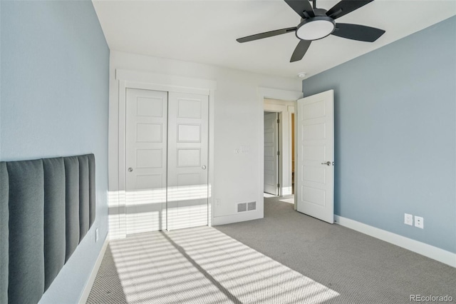 5668 Galena St, Denver, CO 80238 - unfurnished bedroom featuring carpet, a closet, and a ceiling fan