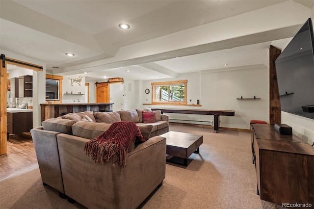 403 Pitkin St, Frisco, CO 80443 - living room featuring a barn door, light carpet, and recessed lighting