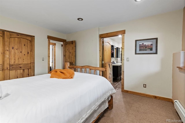 403 Pitkin St, Frisco, CO 80443 - carpeted bedroom featuring a baseboard radiator and baseboards