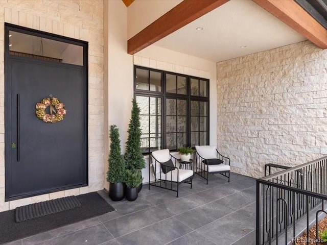 860 Diamond Ridge Cir, Castle Rock, CO 80108 - property entrance featuring covered porch and stone siding