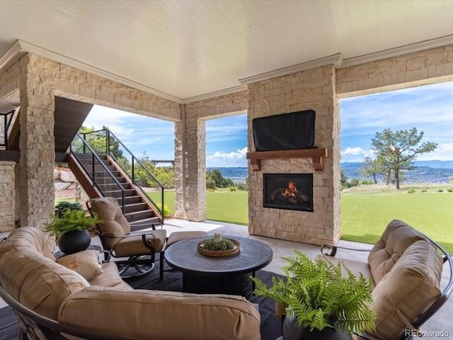 860 Diamond Ridge Cir, Castle Rock, CO 80108 - view of patio with stairway and an outdoor living space with a fireplace