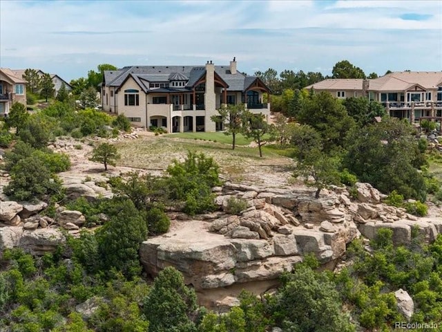 860 Diamond Ridge Cir, Castle Rock, CO 80108 - back of house with a chimney