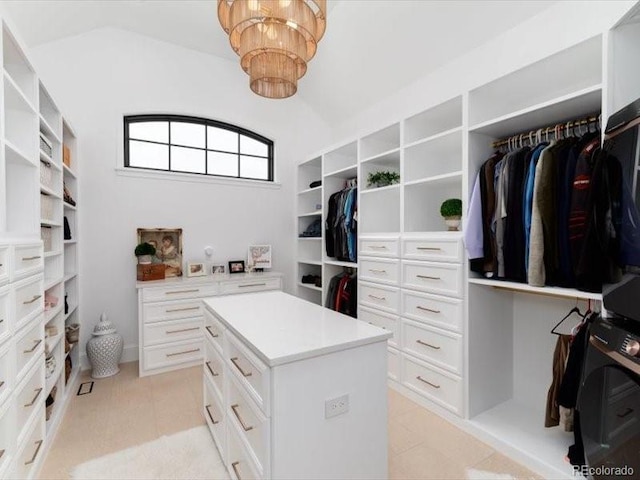 860 Diamond Ridge Cir, Castle Rock, CO 80108 - spacious closet with lofted ceiling, a chandelier, and light tile patterned floors