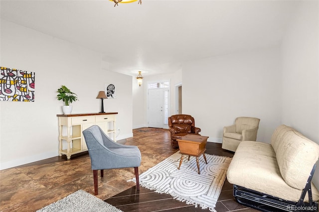 living room featuring baseboards