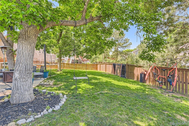9492 Crestmore Way, Highlands Ranch, CO 80126 - fenced backyard with a patio area