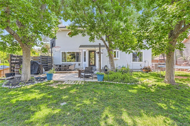 9492 Crestmore Way, Highlands Ranch, CO 80126 - rear view of house featuring a patio
