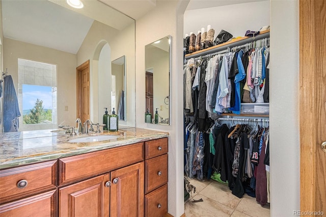 bathroom with vanity and tile patterned floors