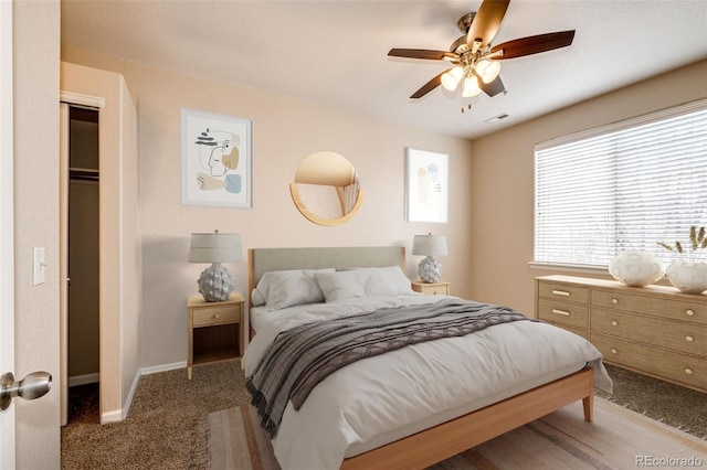 carpeted bedroom featuring ceiling fan