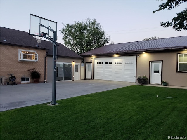 148 15th St, Burlington, CO 80807 - garage featuring concrete driveway