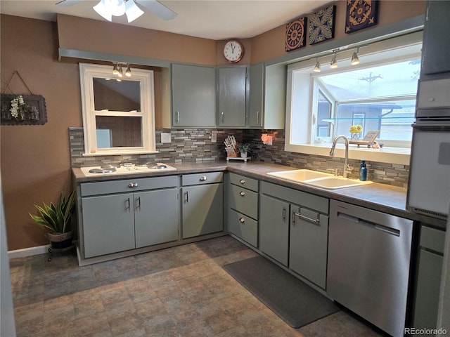 148 15th St, Burlington, CO 80807 - kitchen featuring white appliances, gray cabinets, backsplash, and ceiling fan
