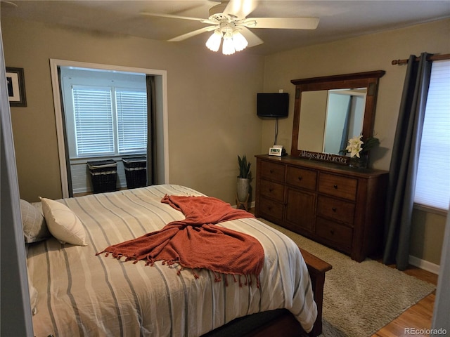 148 15th St, Burlington, CO 80807 - bedroom with wood finished floors and ceiling fan