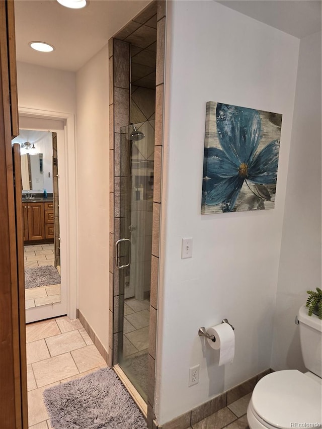 148 15th St, Burlington, CO 80807 - bathroom featuring a stall shower, tile patterned flooring, vanity, and recessed lighting